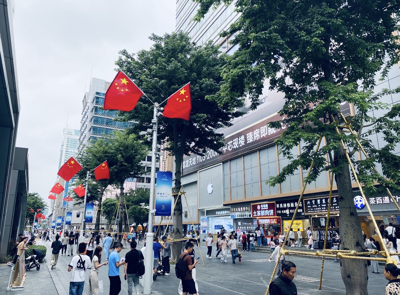 Huaqiangbei pedestrian street β international brands sit alongside local electronics markets